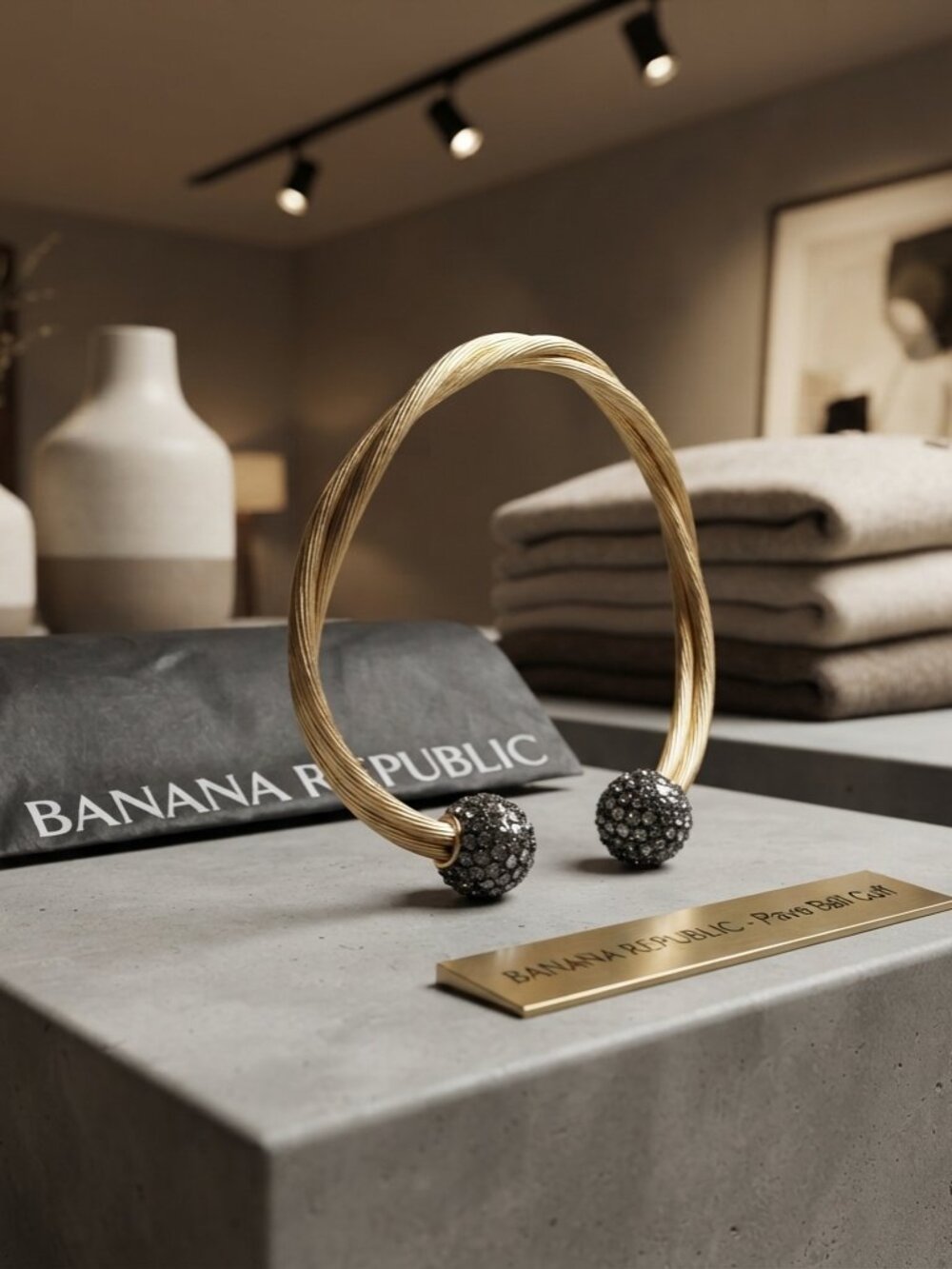 Banana Republic  twisted gold-toned bangle with pave rhinestone balls
